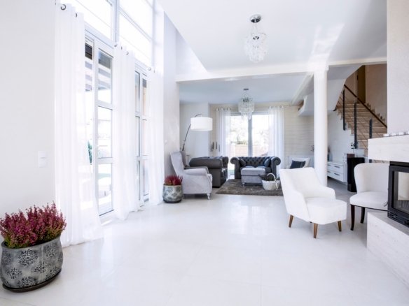 Living room with big windows Your Gateway to Properties in Laos
