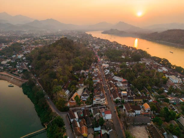 Scenic aerial view of Luang Prabang town and Mekong river Your Gateway to Properties in Laos